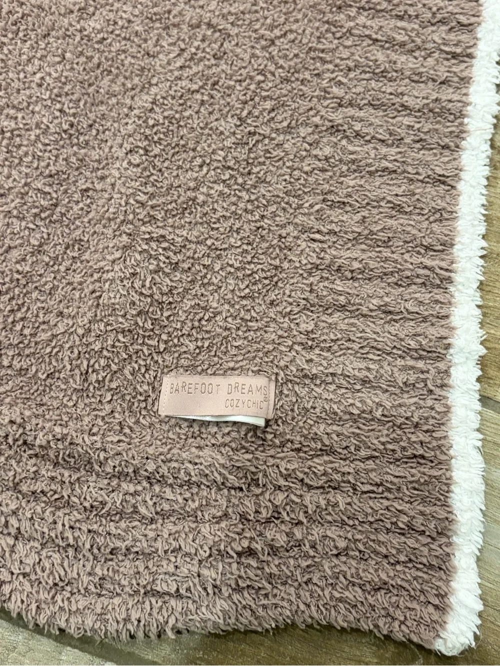Barefoot Dreams CozyChic mauve pink throw